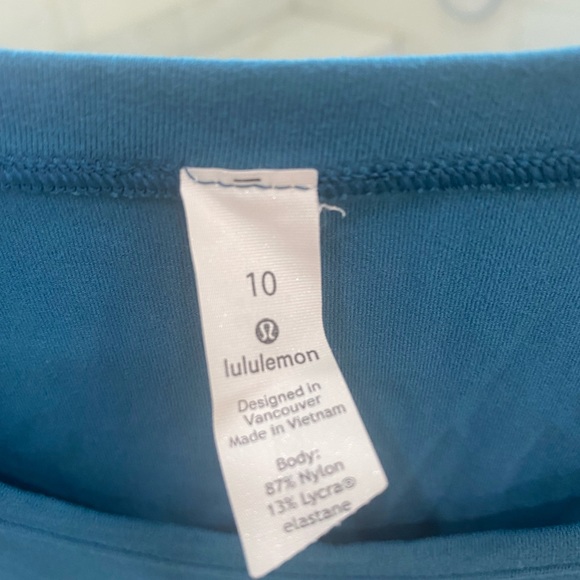 Lululemon discontinued top. Teal blue. Size 10 oversized shirt with side slit. - Picture 2 of 3